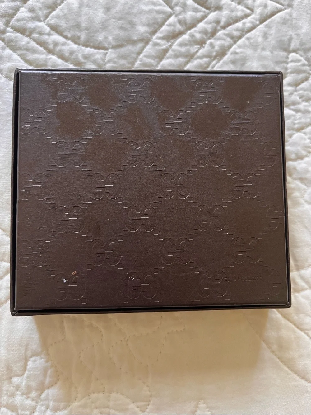 Gucci embossed pattern